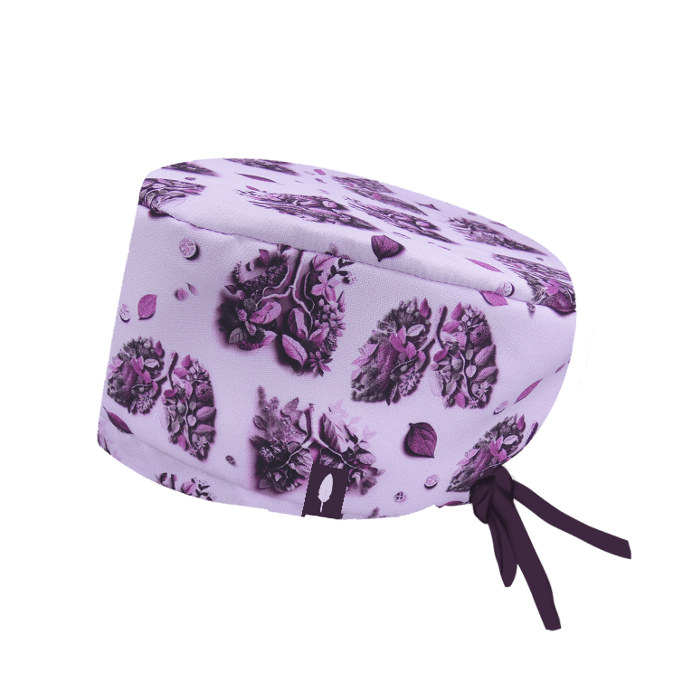 Gorro de Quirófano con flores en forma de pulmón de color rosa.