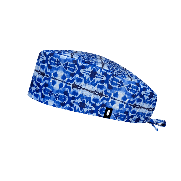 Gorro quirúrgico BOHO con estampado tie-dye azul y tejido técnico ideal para quirófano y sala blanca. Diseño veraniego y profesional