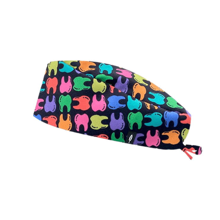 Gorro de quirófano RAINBOW TEETH de Robin Hat, con diseño de dientes multicolor sobre fondo oscuro, ideal para odontólogos.