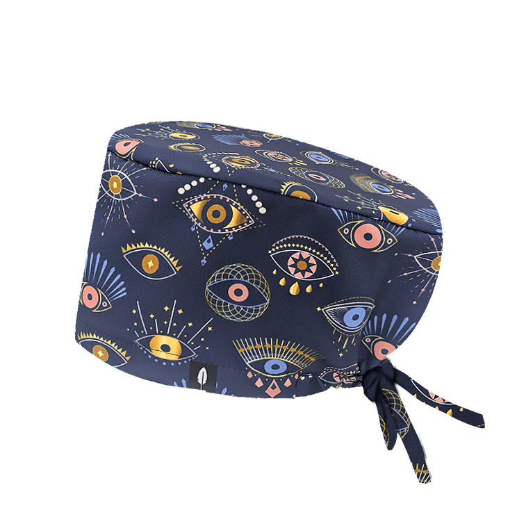 Gorro quirúrgico EYES con diseño de ojos geométricos en tonos elegantes Tejido de poliéster suave y transpirable.