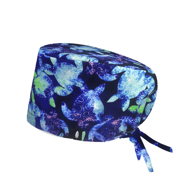 Gorro de quirófano Sea Turtle de Robin Hat, con un diseño marino lleno de tortugas y colores vibrantes