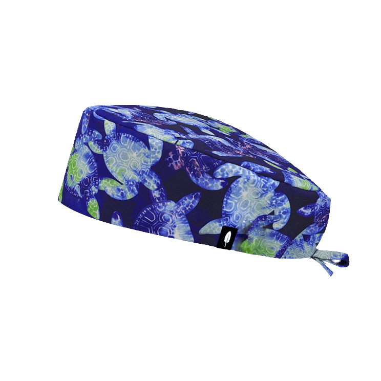 gorro quirogano Sea Turtle con tortugas sobre fondo azul.