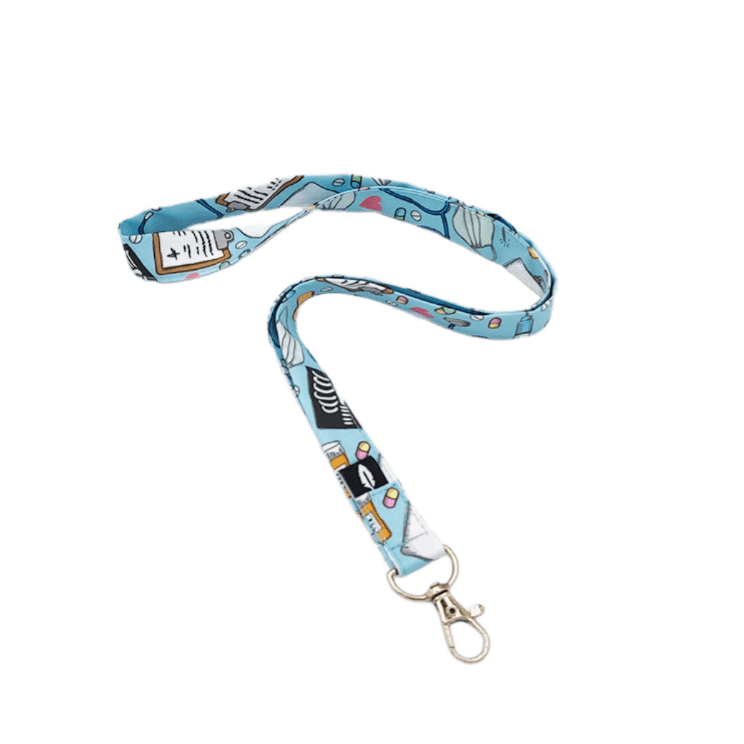 Lanyard MEDICAL de algodón con un diseño lleno de símbolos médicos, ideal para profesionales sanitarios.
