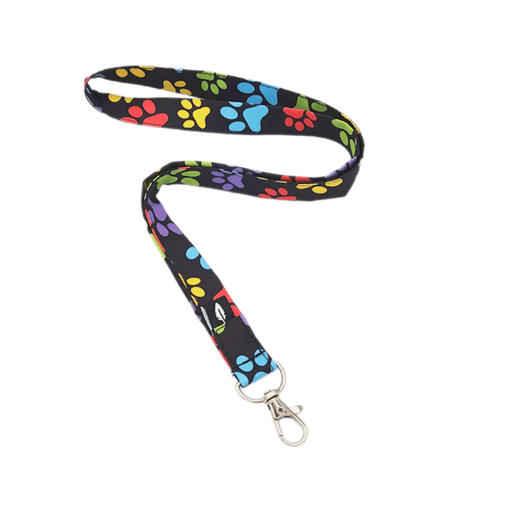 Lanyard MASCOTAS de poliéster con un diseño de huellas multicolor, ideal para profesionales sanitarios y amantes de los animales.