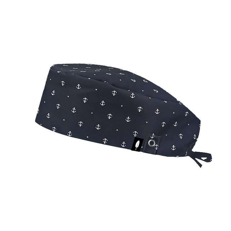 gorro quirófano robin Hat Palamós. decorado con pequeñas anclas azules sobre fondo azul marino. Ideal para médicos con pelo corto. Gorro de quirofano unisex.
