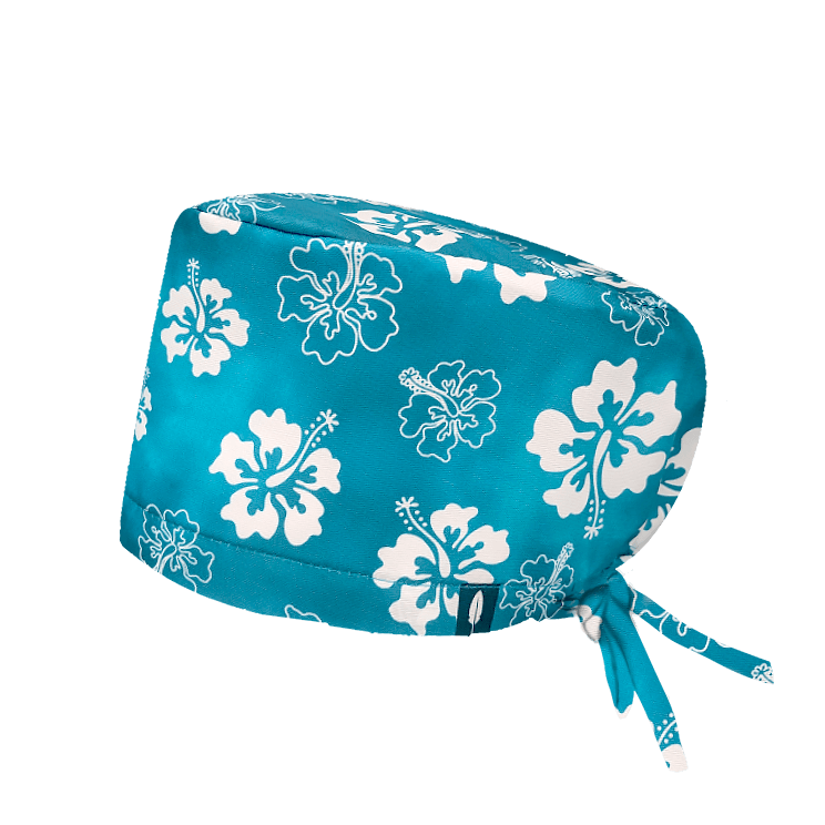 Gorro quirúrgico ALOHA BLOOM de Robin Hat con flores de hibisco. Tejido técnico ideal para quirófano y sala blanca. 