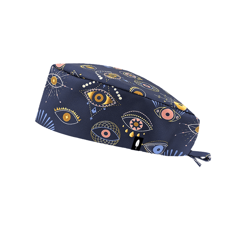 Gorro quirúrgico EYES con diseño de ojos geométricos en tonos elegantes Tejido de poliéster suave y transpirable.