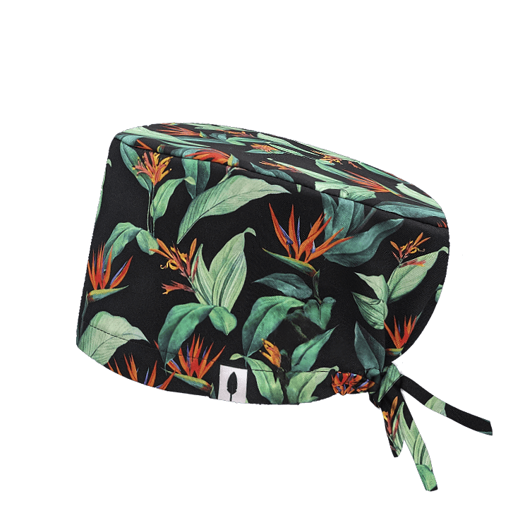 Gorro quirúrgico FLOR DEL PARAÍSO de Robin Hat con ilustraciones exóticas sobre fondo blanco o negro