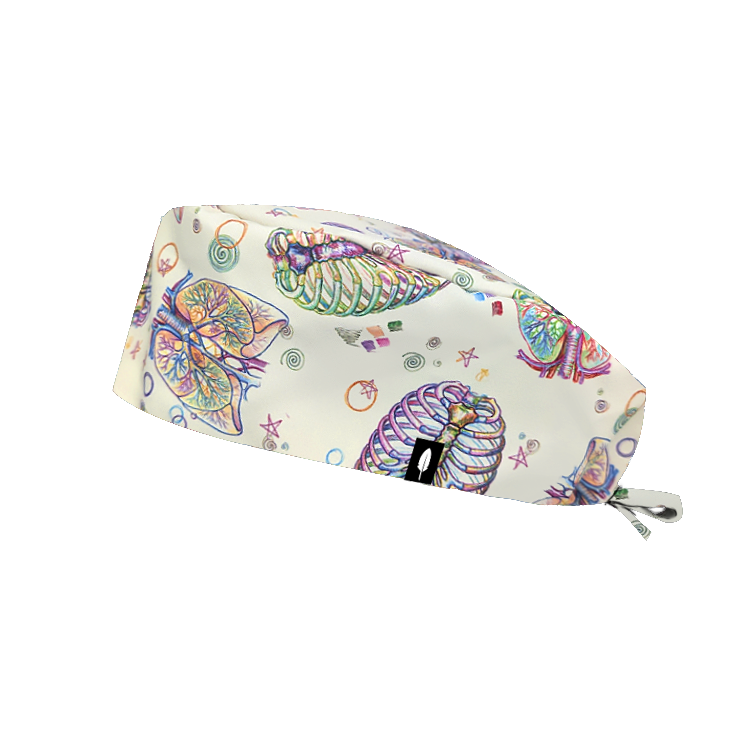 TORAX es un gorro quirúrgico  para pelo corto lleno de detalles relacionados con la Cirugía Torácica.